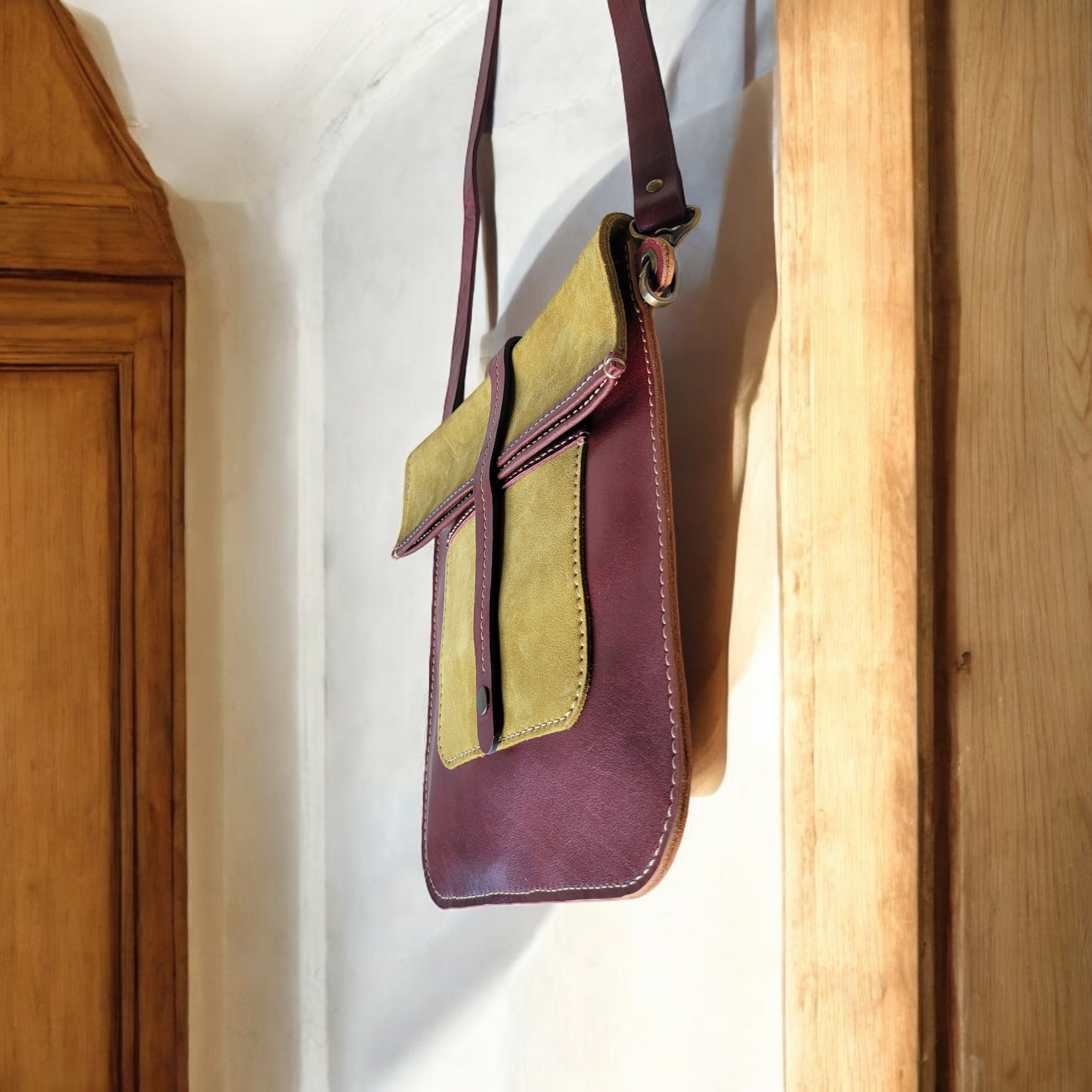 Artisan dual-tone crossbody with structured design